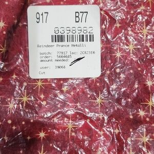 Reindeer prance metallic fabric